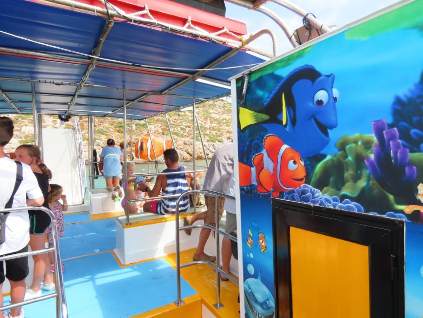 Kos Town: Glass-Bottom Boat Cruise with Swimming Stops - Glass-bottom viewing over the shipwreck: what you should expect