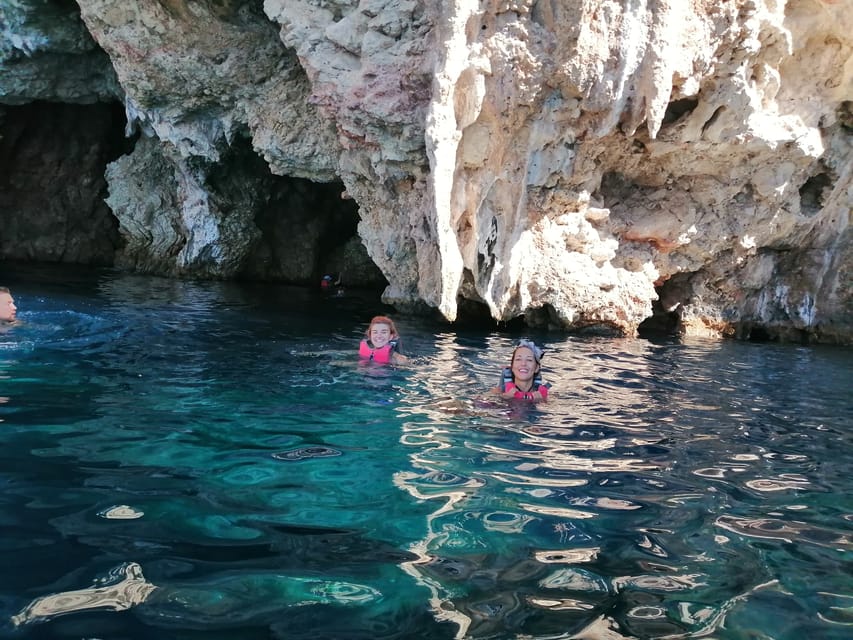 Lefkada: Blue Cave Kayak Tour with a Taste of Greece - Blue Cave time: turquoise light, stalactites, and snorkeling gear