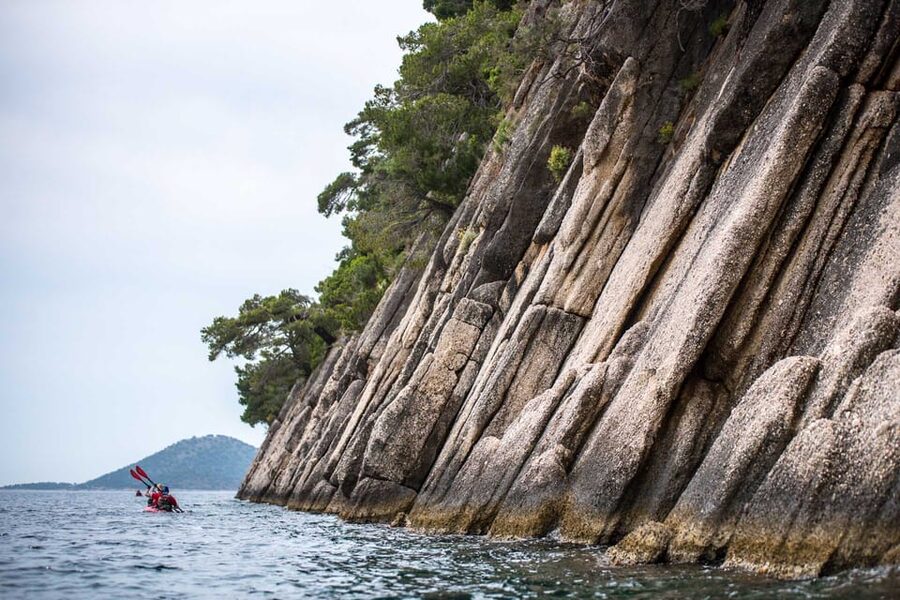 Lefkada: Blue Cave Kayak Tour with a Taste of Greece - Mikros Gialos launch point and the paddle into Rouda Bay