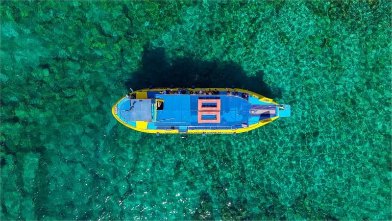 Lindos: Submarine Cruise with Swimming Stop at Navarone Bay - Onboard Comfort: Dry Air-Conditioned Time, WiFi, and That Little Beverage Bonus