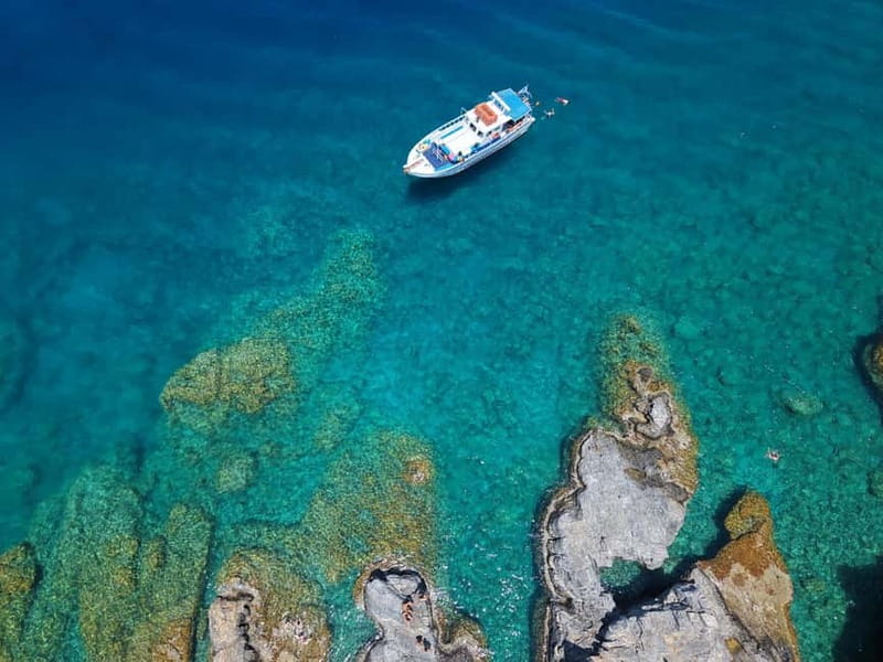 Lindos: Sunset Cruise with Unlimited Aperol, Beers & Wine - The swim and snorkel portion: bays, caves, and crystal-clear water moments