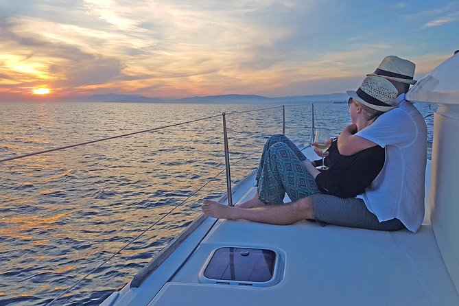 Luxury Catamaran Cruise from Athens with Traditional Greek Meal and BBQ - From your hotel to Alimos Marina, without the headache