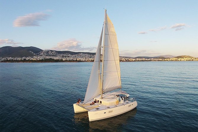 Luxury Catamaran Cruise from Athens with Traditional Greek Meal and BBQ - Morning lunch vs sunset dinner: choose based on your mood
