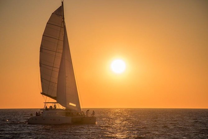 Luxury Small-Group Catamaran Cruise with BBQ, Open bar & Transfer - Mesa Pigadia Beach stop: quiet cove swimming and snorkeling