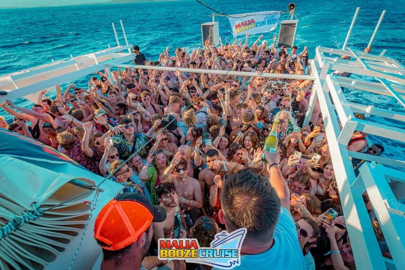 Malia: Booze Cruise Boat Party with Live Dj - Boarding at 16:00: two decks, big-group energy, and what you’ll notice right away