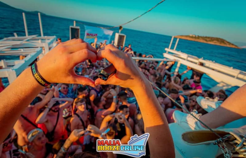Malia: Booze Cruise Boat Party with Live Dj - The 4 hours at sea: DJ sets, games, and swim stops in the right bay