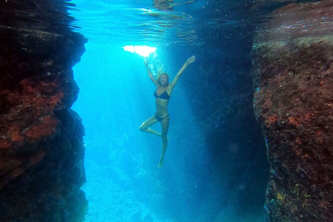 Milos caves snorkelling Catamaran Cruise in a small group - Kalogries Beach: First Swim Stop and a Light Breakfast