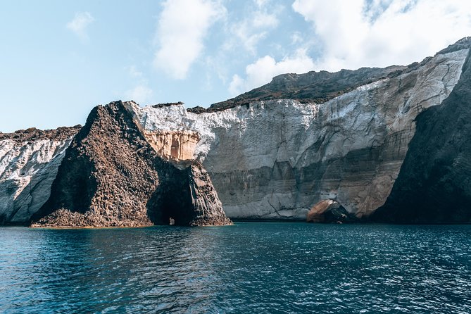 Milos caves snorkelling Catamaran Cruise in a small group - Kleftiko Beach: Snorkel Gear, Dinghy Cave Visits, and Lunch