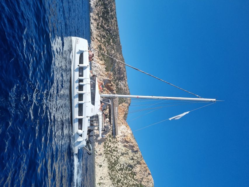 Milos: Full-Day Catamaran Cruise with Food and Open Bar - Thiorichia, Then Poliegos and the Blue Lagoon