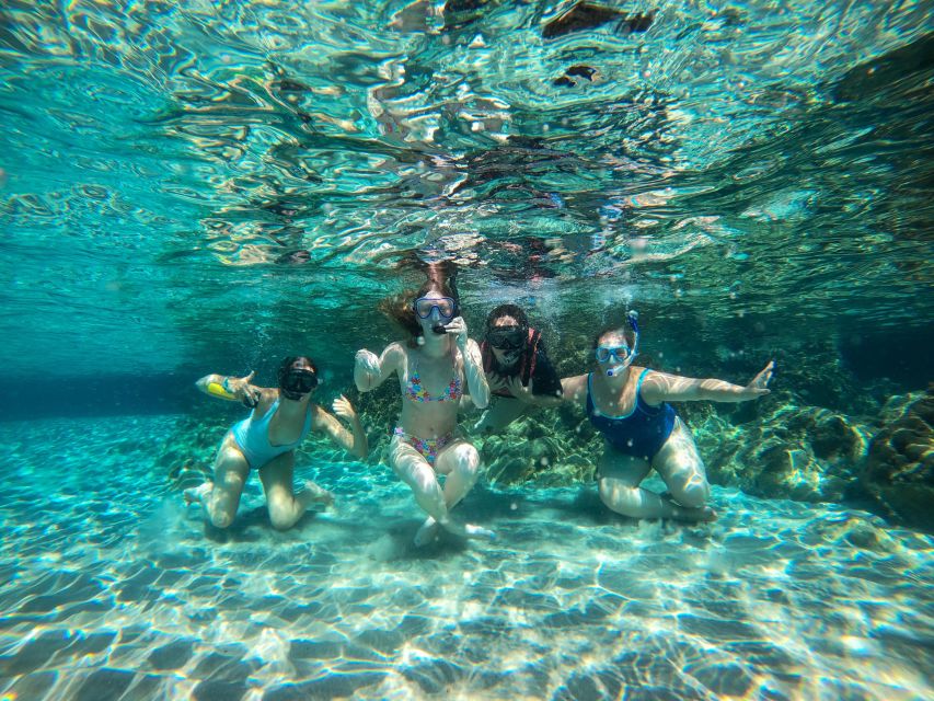 Milos: Tsigrado and Gerakas Beach Kayaking Tour - Tsigrado Beach: Your First Real Water Stop and Cave Scenery