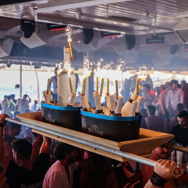 Mykonos: Best Beach Clubs Crawl Day Party - Sun loungers, food, and the extra costs you should plan for