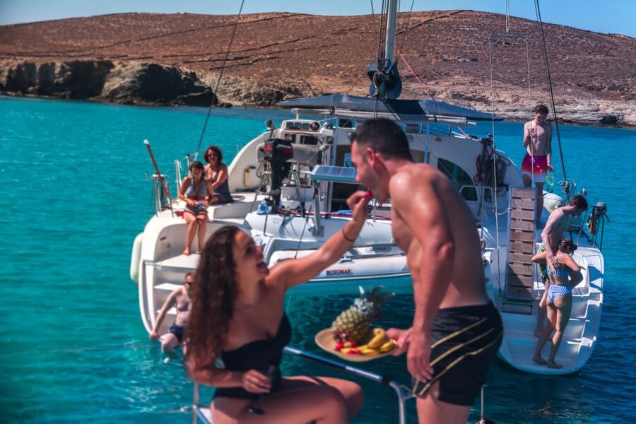 Mykonos: Catamaran Cruise with Lunch, Drinks and Transfer - Sailing Back Past Windmills and Mykonos Views