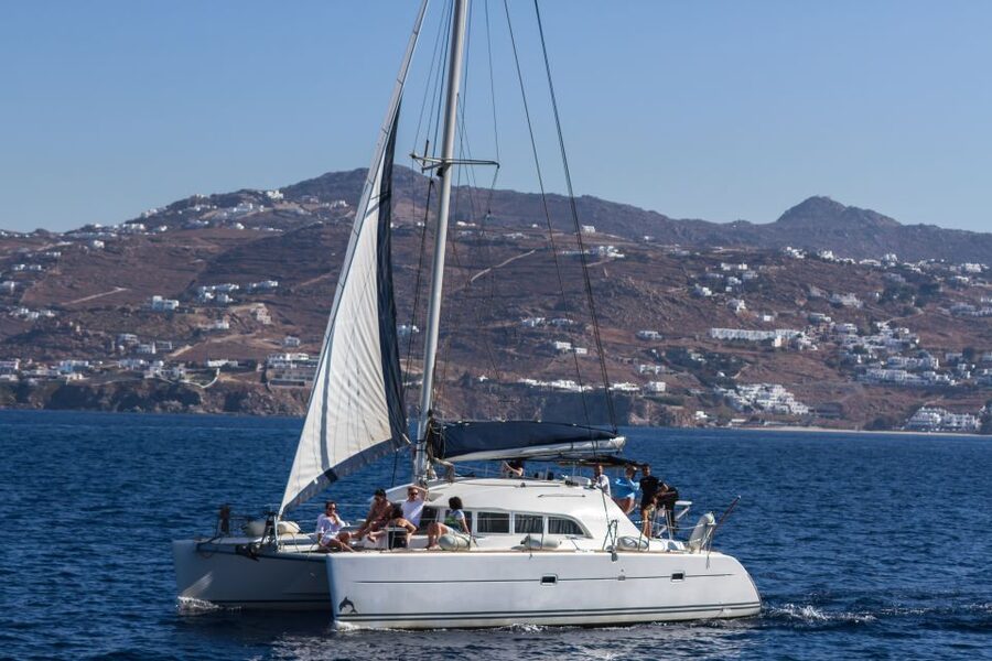 Mykonos: Catamaran Cruise With Meal and Drinks - Sailing along Mykonos, with wine and views to match