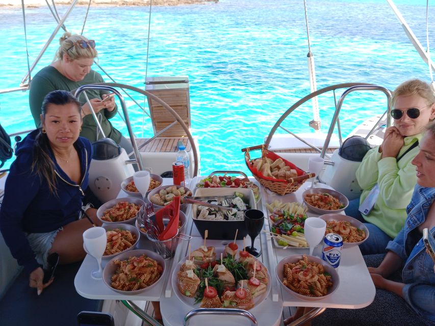 Mykonos: Delos and Rhenia Cruise with Swim and Greek Meal - A 6-hour Mykonos sail that mixes UNESCO ruins and swim time