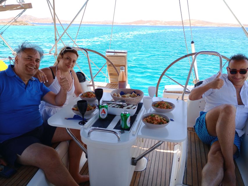 Mykonos: Delos and Rhenia Cruise with Swim and Greek Meal - Rhenia Island swim and snorkel time with real gear