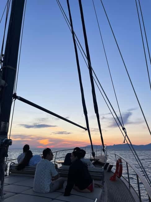 Mykonos: Sunset Boat Cruise with Light Dinner & Drinks - Swimming and snorkeling stops in Elia and Super Paradise