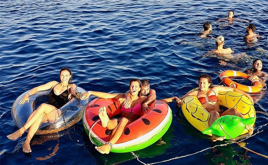 Mykonos: Sunset Boat Party with Open Bar & Live DJ - Inflatables, a Jumping Board, and a DJ Who Keeps Time
