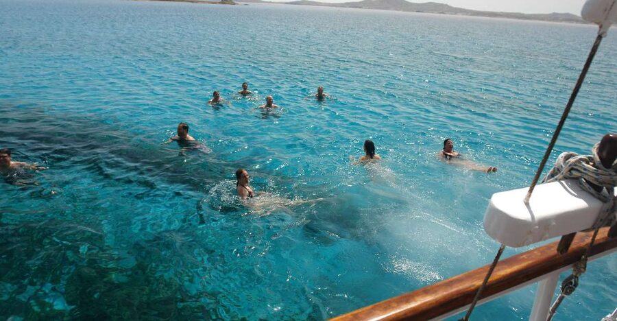 Mykonos: Sunset Party Boat Cruise with 1 Drink - Getting On Board: Old Port Check-In and the 5:30 PM Timing