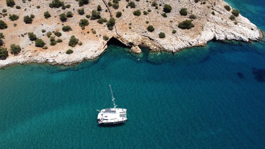 Naxos: Catamaran Cruise with Lunch & Drinks - Stop 1: the first swim cove and why early shade matters