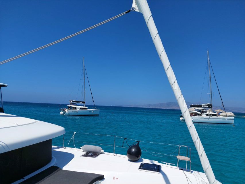 Naxos: Catamaran Cruise with Swim Stops, Food, and Drinks - Getting on board in Naxos, and what the boat setup means
