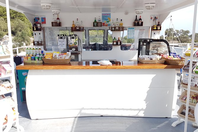Paxos Antipaxos Blue Caves (Lakka Village) from Corfu - Onboard vibe, multilingual guiding, and how to avoid common annoyances