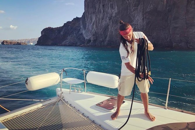 Premium Small-Group Catamaran Cruise with BBQ, Open Bar, Transfer - Photo stops at Red Beach and White Beach, where the sea does the showing