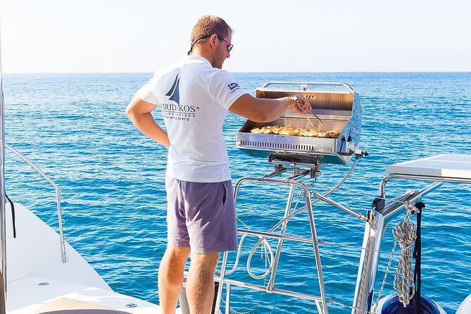 Premium Small-Group Catamaran Cruise with BBQ, Open Bar, Transfer - Mesa Pigadia: your first real swim or relax moment