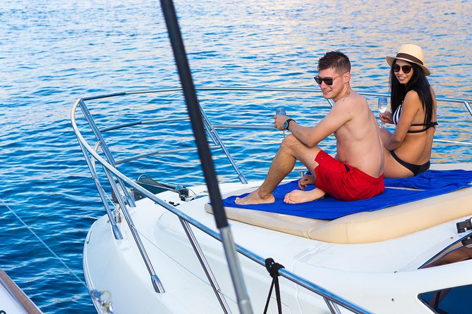 Private Motor Yacht Cruise with BBQ, Open Bar & Transfers - Hot springs at Palea Kameni, then Nea Kameni for more swim time