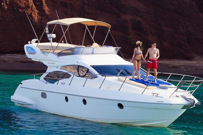 Private Motor Yacht Cruise with BBQ, Open Bar & Transfers - Thirassia, Saint Nicolas chapel, and the Ammoudi Bay finish