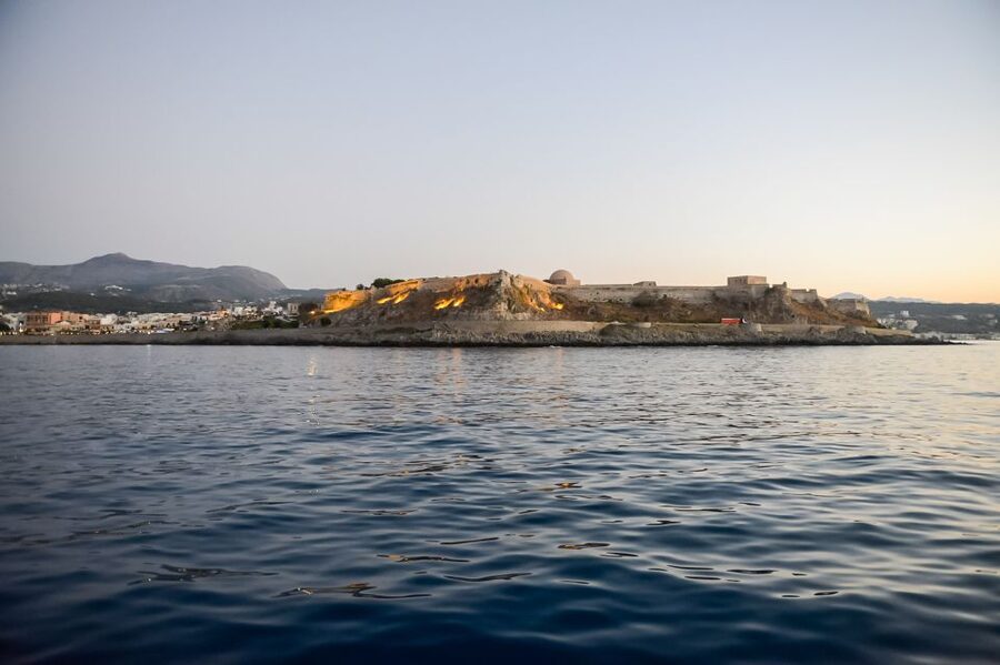 Rethymno: Sunset Cruise on a Wooden Pirate Boat - The sunset over the horizon, then the harbor lights switch on
