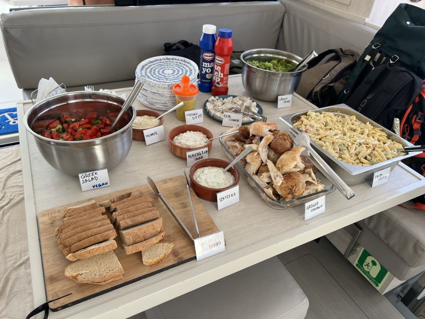 Rhodes: All-Inclusive Catamaran Cruise with Lunch and Drinks - Getting There at Mandraki Harbor and Beating the Timing Crunch