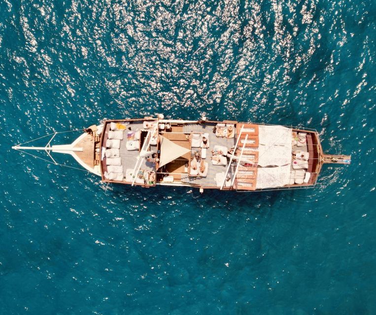 Rhodes: All Inclusive Day Cruise with BBQ & Unlimited Drinks - Top deck bean bags versus downstairs tables: where you should sit