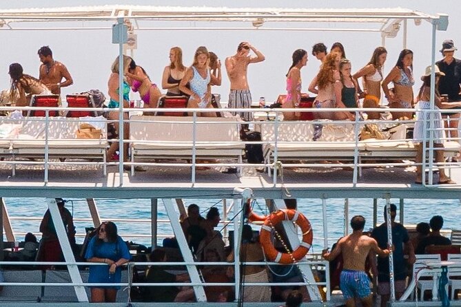 Rhodes Bay to Bay Swim Cruise-Greek Buffet w/wine included - Food, wine, and onboard extras that keep the day comfortable