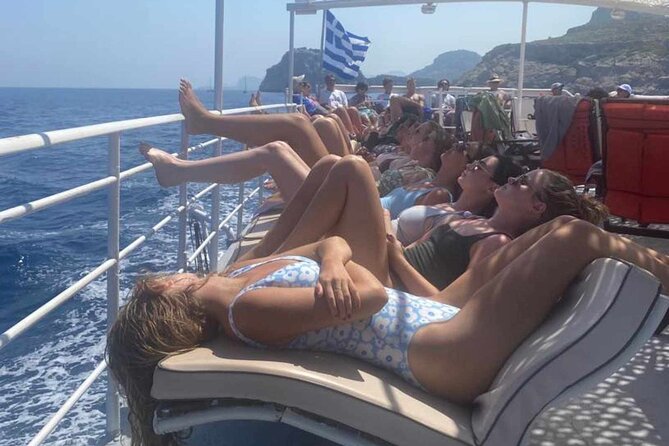 Rhodes Bay to Bay Swim Cruise-Greek Buffet w/wine included - Mandraki Old Port to the Colossus site: Rhodes landmarks from the sea