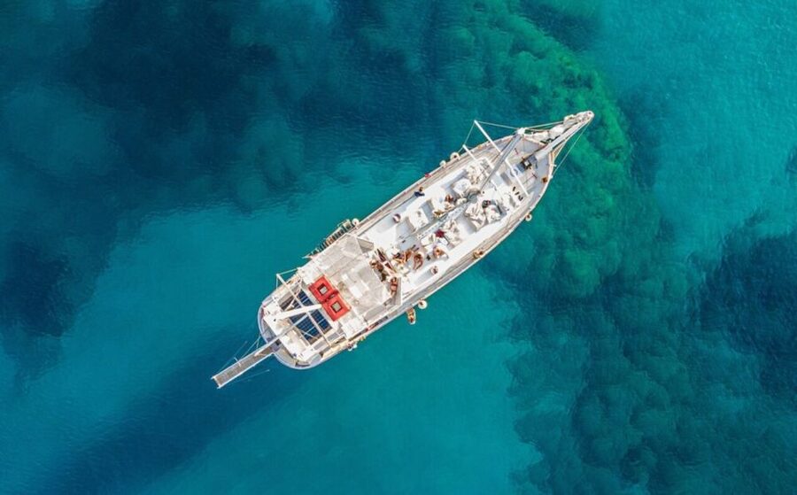 Rhodes: Boat Tour with Snorkeling, Gourmet Buffet & Open Bar - Mandraki pickup, meeting point, and getting your best seat