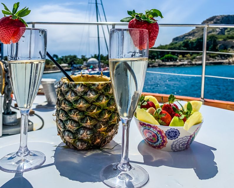 Rhodes: Cruise with 3 Stops, Lunch and Unlimited Drinks - The First Hour Afloat: Wooden-Boat Comfort and Onboard WiFi