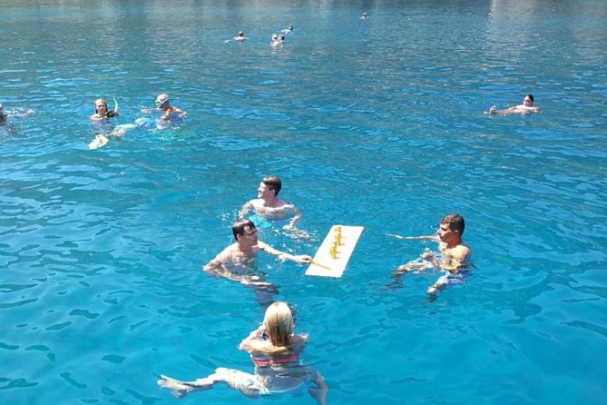 Rhodes Exclusive Swim Cruise Cocktail Open bar & Gourmet Buffet - Anthony Quinn Bay: snorkeling with thousands of small fish and provided gear
