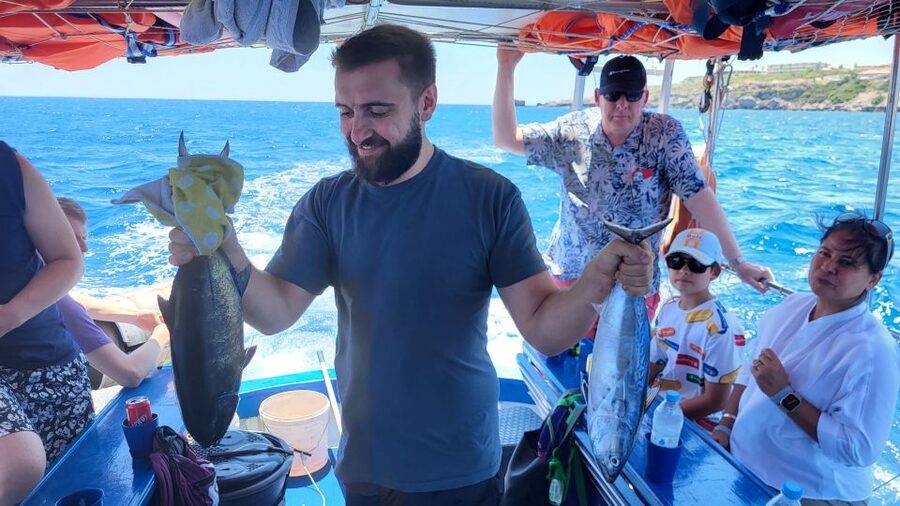 Rhodes: Fishing Trip, Snorkelling, BBQ, & Professional Guide - Snorkelling and Swimming in a Quiet Bay: A Break That Feels Earned