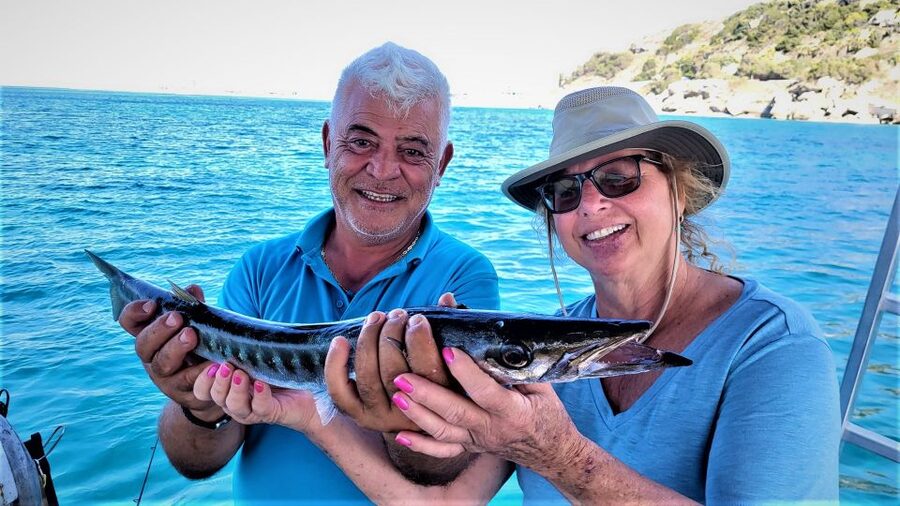 Rhodes: Fishing Trip, Snorkelling, BBQ, & Professional Guide - Lunch on the Boat: Fish BBQ, Gold Seabream, Sea Bass, and Greek Salad That Steals the Show