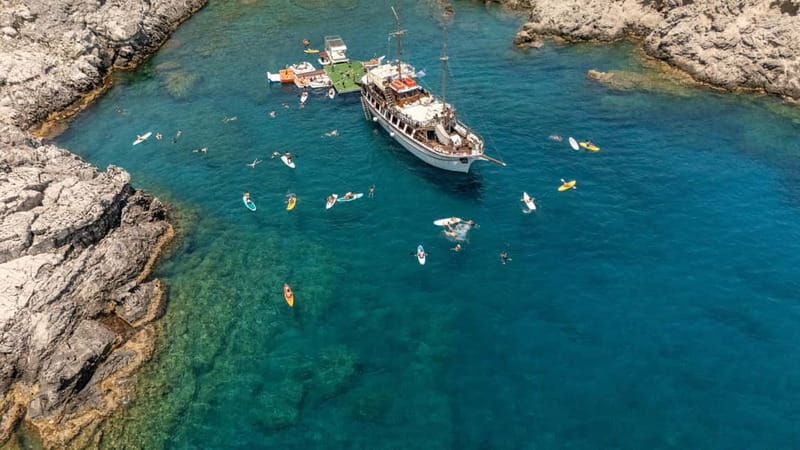 Rhodes: Gulet Trip with Food, Drinks, SUP, Kayak & Swimming - Traditional Greek Lunch, Snacks, and How the Meal Fits the Day