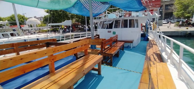 Rhodes: Pleasure Cruise for Swimming and Snorkeling - A 6-Hour Wooden Boat Cruise That Fits Real Rhodes Time