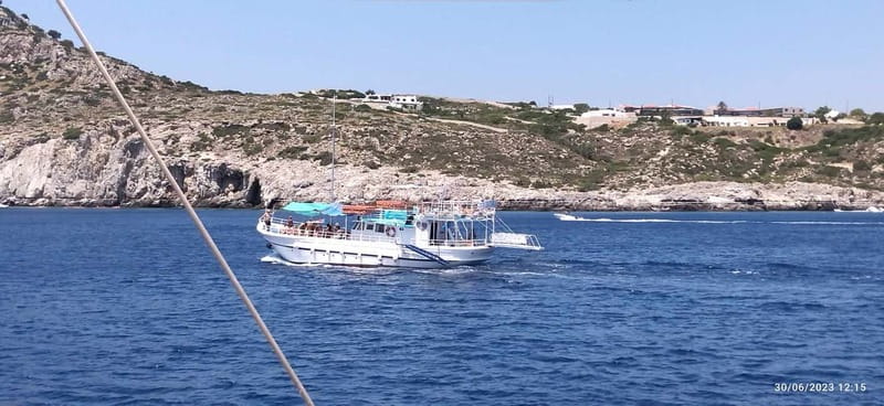 Rhodes: Pleasure Cruise for Swimming and Snorkeling - Getting On Board at Mandraki, By the Alexander Statue