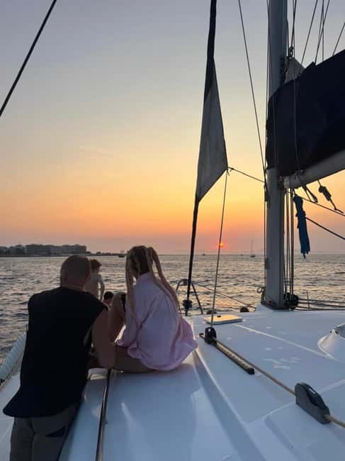Rhodes: Sunset Catamaran Cruise with Snack, Fruits & Drinks - Kalithea Springs Bay: the swim and snorkel stop that makes the trip