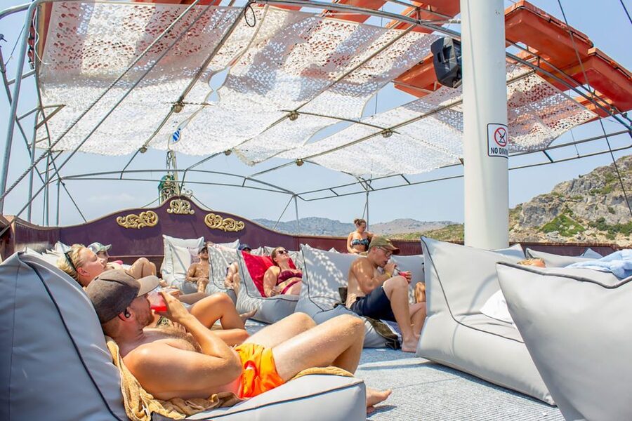 Rhodes: Sunset Cruise with Greek BBQ and Unlimited Drinks - Sunset in Rhodes Town: When the Timing Clicks