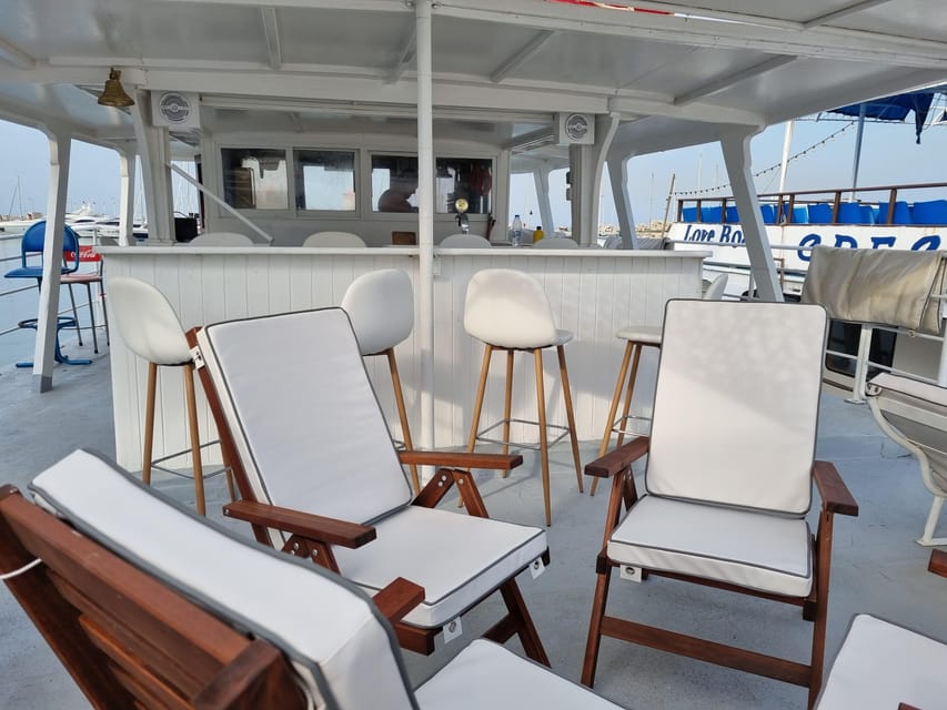 Rhodes: Sunset Cruise with Live Music, Wine & Greek Buffet - The Wine and Greek Buffet Setup: What You Get, What Costs Extra