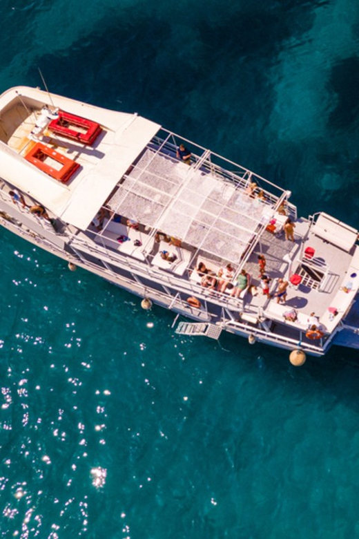 Rhodes: Sunset Cruise with Live Music, Wine & Greek Buffet - Sunset at Mid-Sea: the Part That Changes the Mood