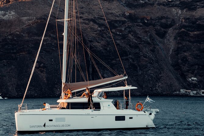 Romantic Sunset Catamaran Caldera Cruise incl. Meal & Drinks - Transfers, meeting point, and timing at Ammoudi Bay