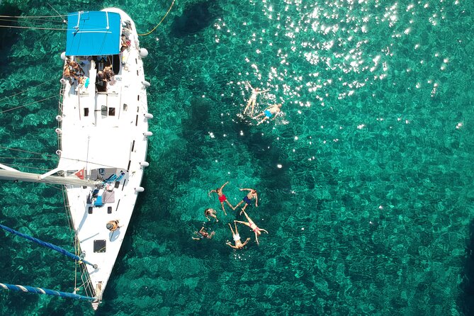 Round of Milos and Poliegos Sailing boat snorkelling cruise - A long day on a catamaran, planned around real water time