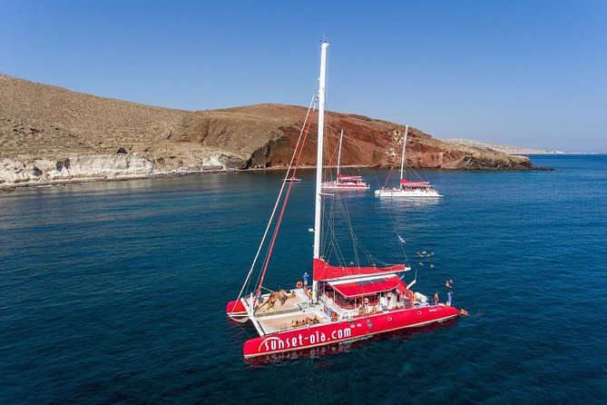 Sailing Catamaran Cruise in Santorini with BBQ, Drinks and Transfer - Pickup, ports, and the 9:30 am flow of the day