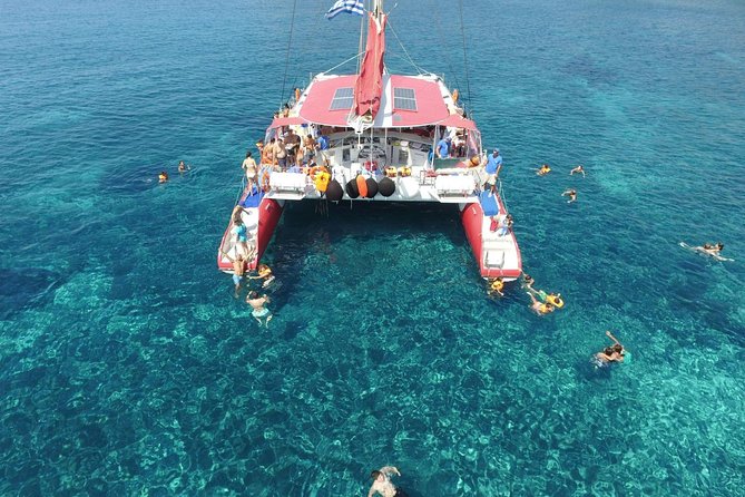 Sailing Catamaran Cruise in Santorini with BBQ, Drinks and Transfer - Red Beach swim time and snorkeling equipment